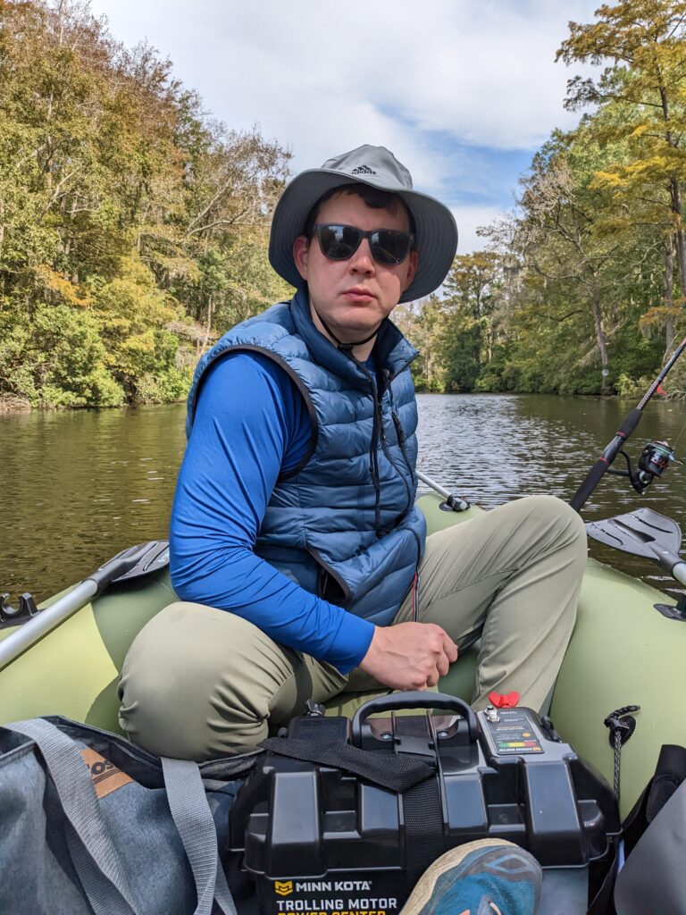 An image of Marcus in a boat.